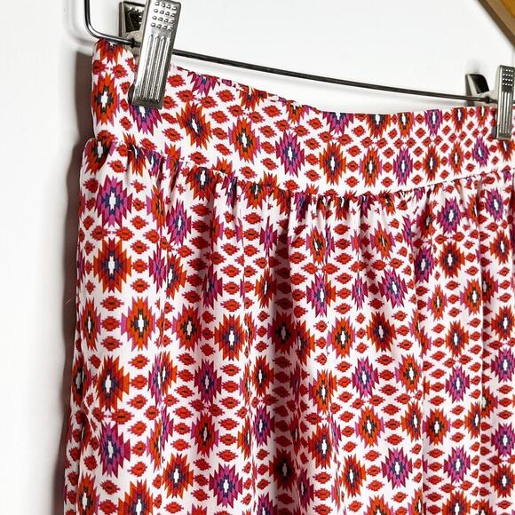 Socialite Womens Mini Skirt S Geometric Ikat Print Orange & Pink Pleated Pull On - Picture 2 of 5